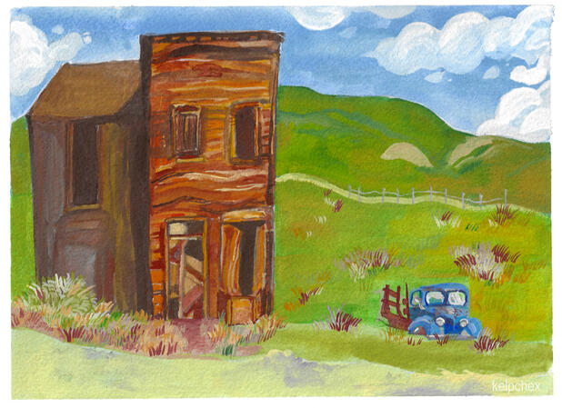 An abandoned house stands in a field next to a broken down truck.